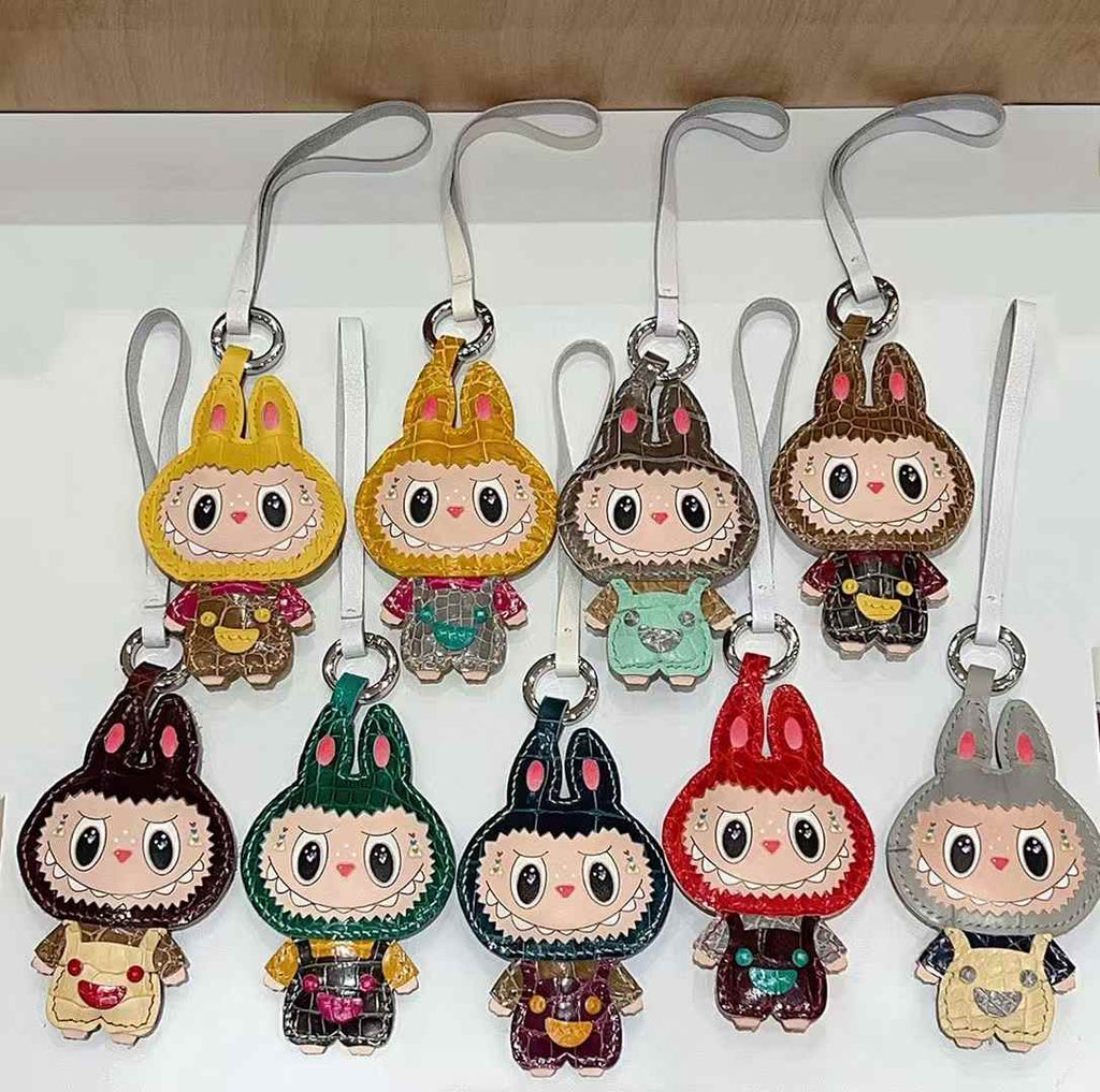 Luxury handcrafted，Cute keychains and backpack charms made. of genuine leather 钥匙、背包手工真皮挂件.