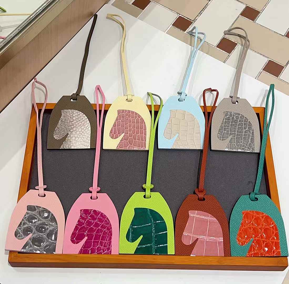 Luxury handcrafted,..Cute keychains and backpack charms made of genuine leather 钥匙、背包手工真皮挂件.