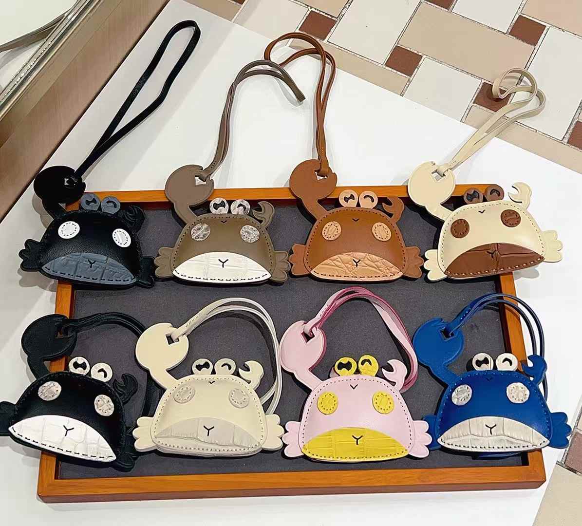 Luxury handcrafted，Cute keychains and backpack charms made. of genuine leather 钥匙、背包手工真皮挂件.