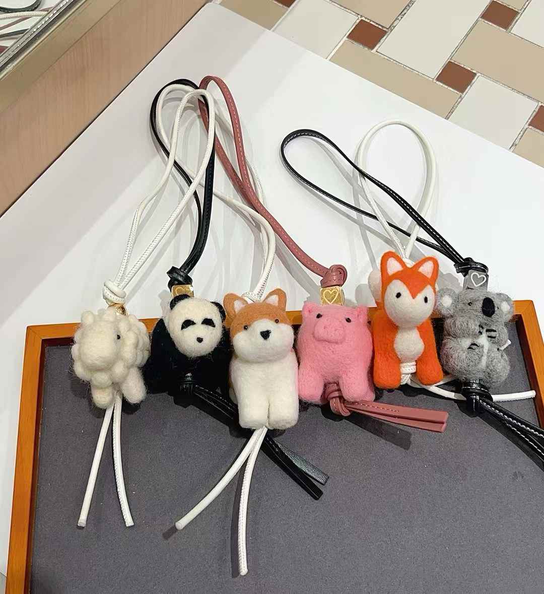 Luxury handcrafted，Cute keychains and backpack charms made...,of genuine leather 钥匙、背包手工真皮挂件