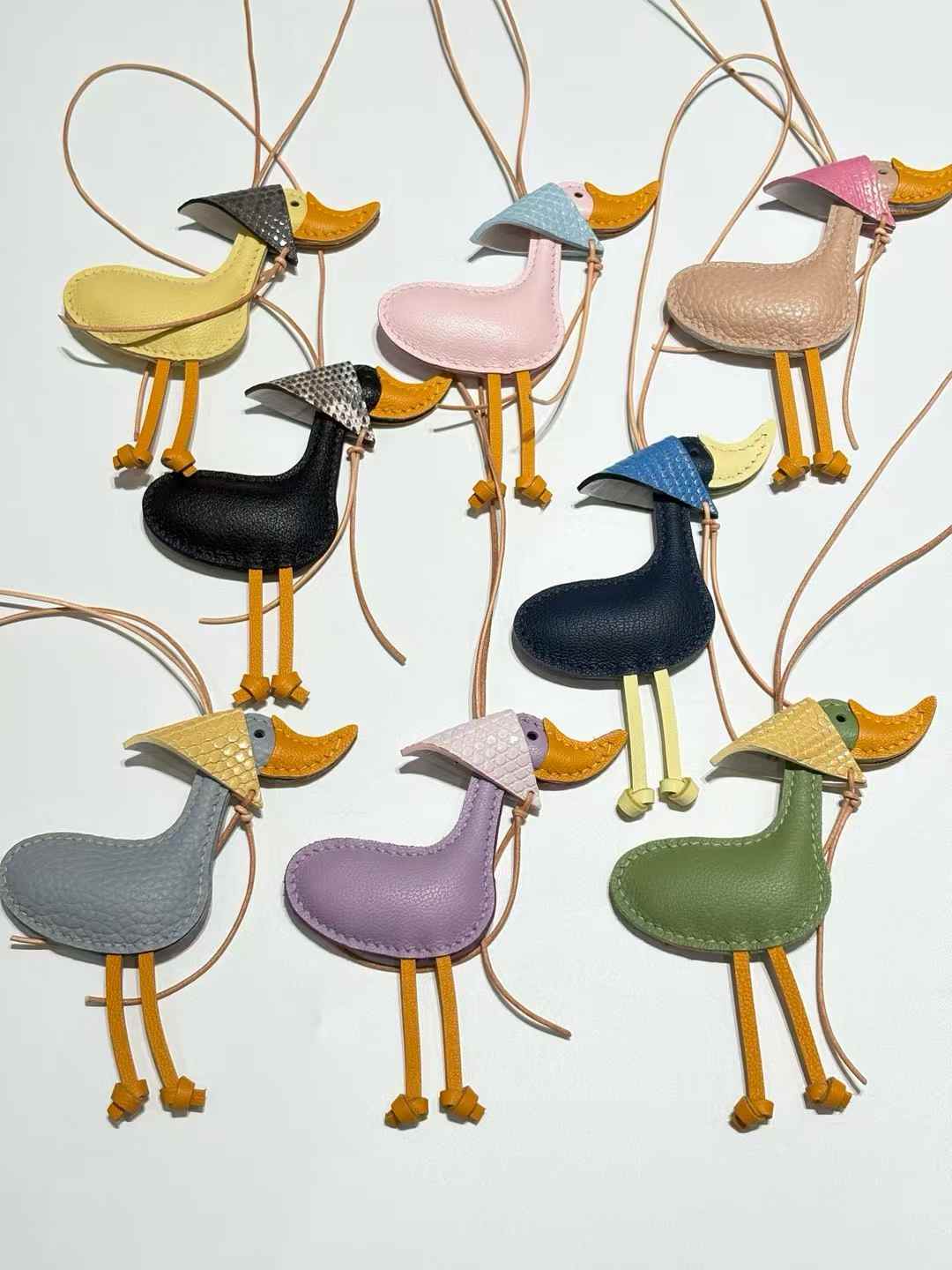 Luxury handcrafted，Cute keychains and backpack charms made.,of genuine leather 钥匙、背包手工真皮挂件.（副本）