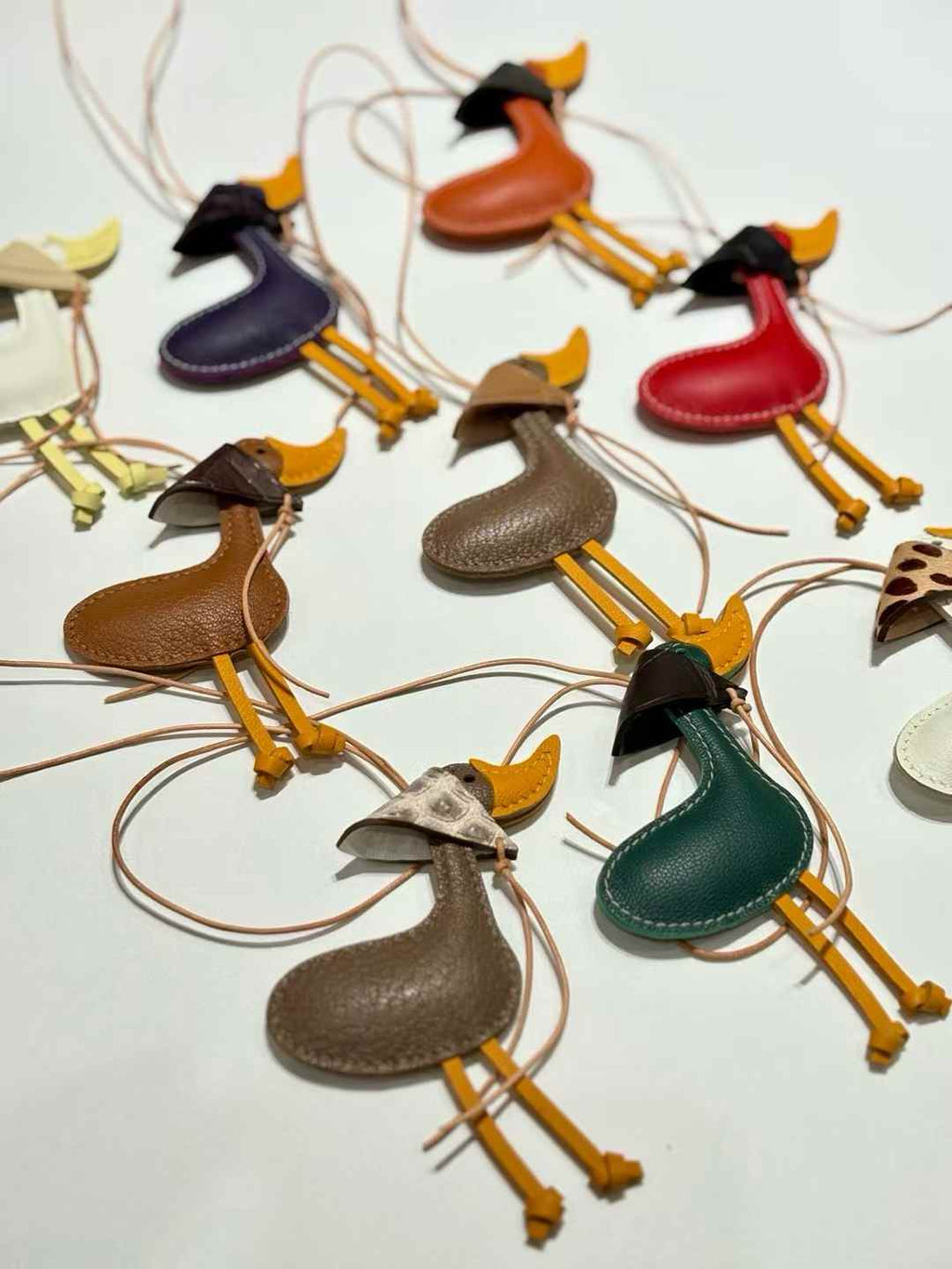 Luxury handcrafted，Cute keychains and backpack charms made.,of genuine leather 钥匙、背包手工真皮挂件