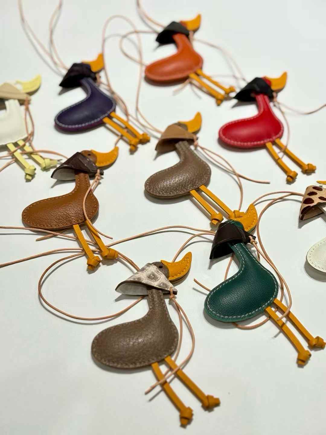 Luxury handcrafted，Cute keychains and backpack charms made.,of genuine leather 钥匙、背包手工真皮挂件.（副本）