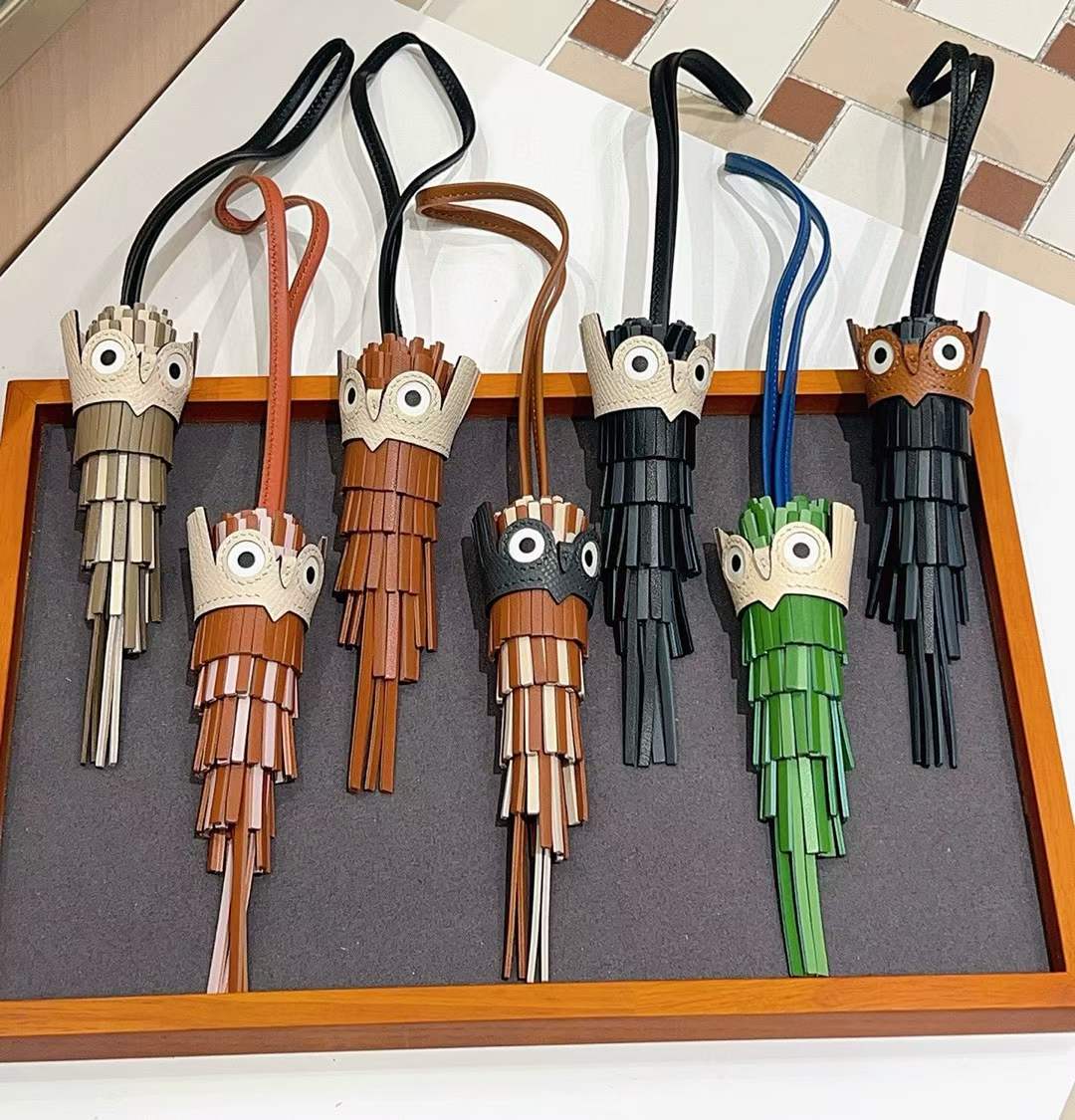 Luxury handcrafted，Cute keychains and backpack charms made.,of genuine leather 钥匙、背包手工真皮挂件'