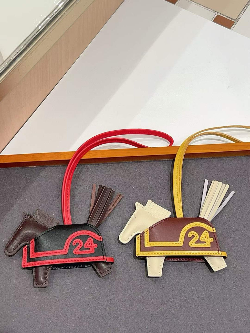 Luxury handcrafted .Cute keychains and backpack charms made of genuine leather 钥匙、背包手工真皮挂件）（副本）（副本）