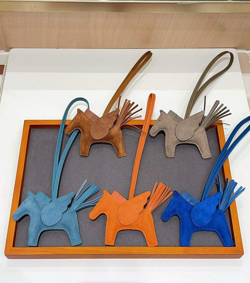 Luxury handcrafted,..Cute keychains and backpack charms made of genuine leather 钥匙、背包手工真皮挂件.（副本）