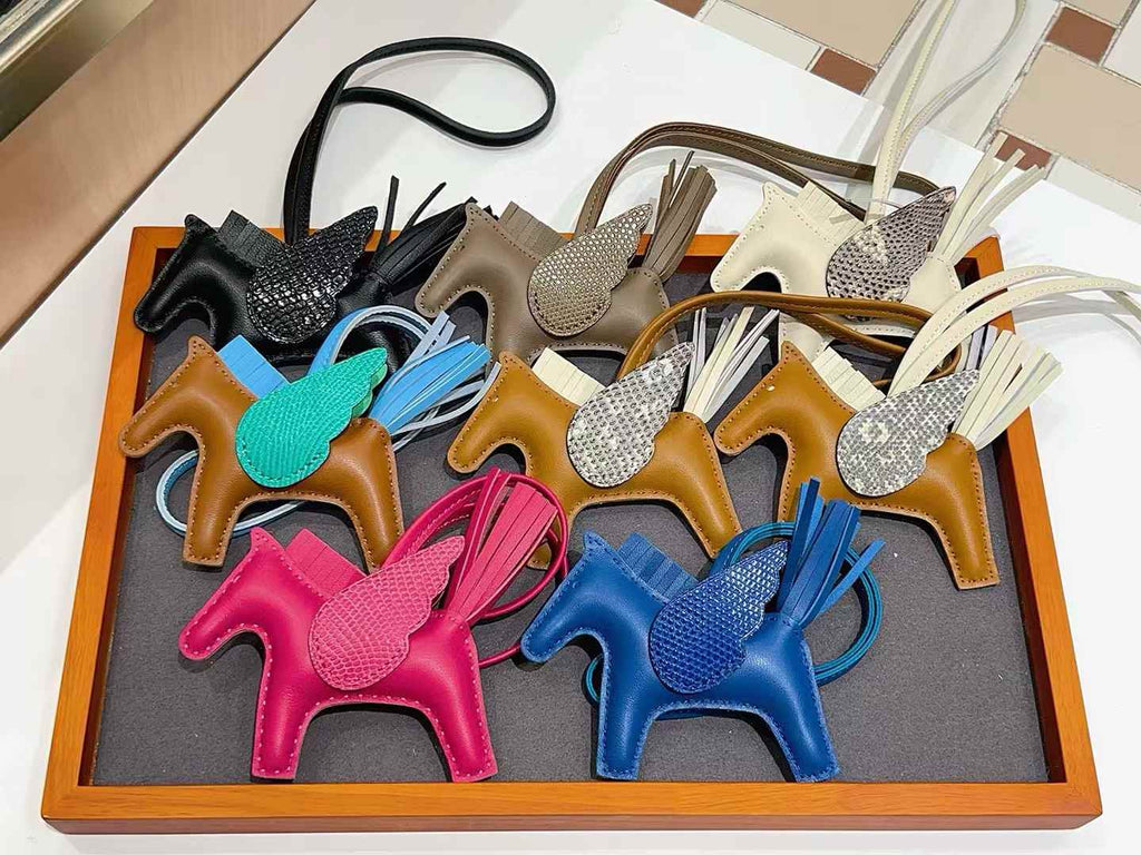 Luxury handcrafted,..Cute keychains and backpack charms made of genuine leather 钥匙、背包手工真皮挂件.（副本）