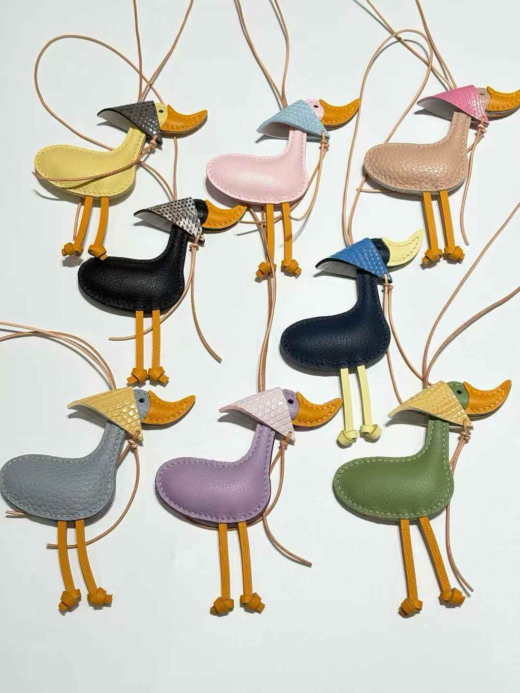 Luxury handcrafted，Cute keychains and backpack charms made.,of genuine leather 钥匙、背包手工真皮挂件