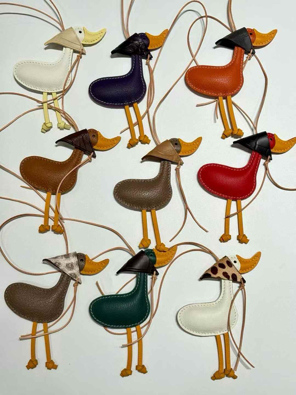 Luxury handcrafted，Cute keychains and backpack charms made.,of genuine leather 钥匙、背包手工真皮挂件