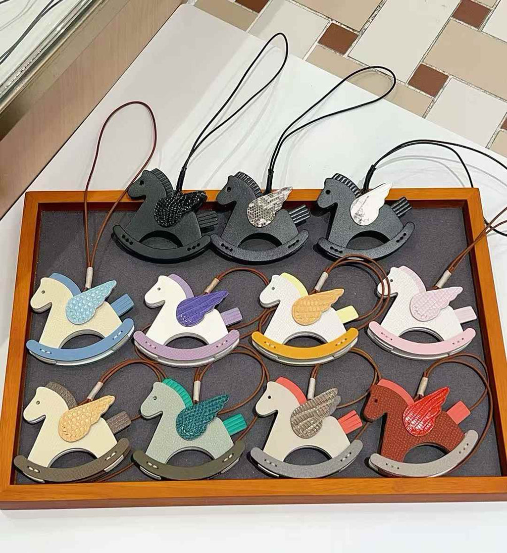 Luxury handcrafted .Cute keychains and backpack charms made of genuine leather 钥匙、背包手工真皮挂件）（副本）（副本）