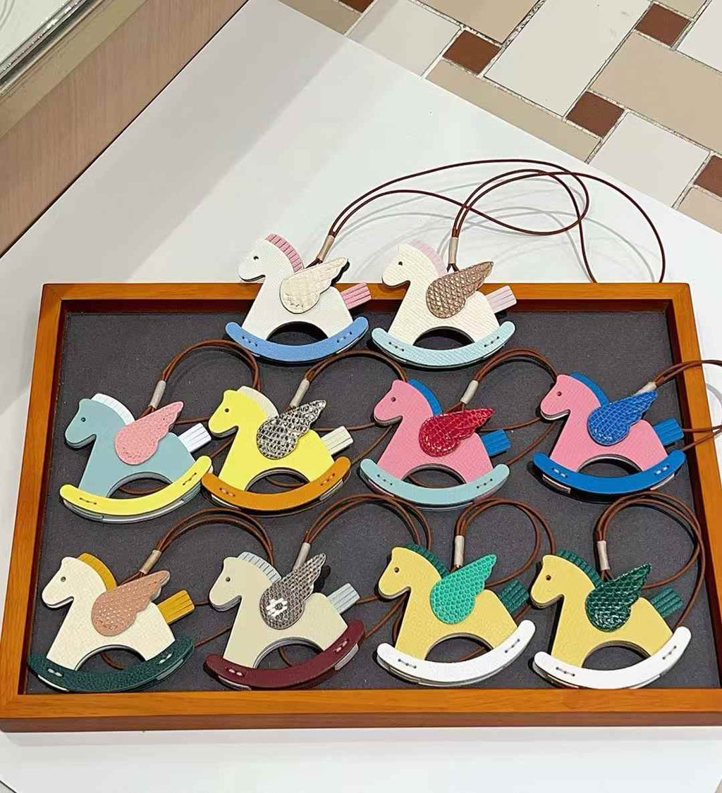 Luxury handcrafted .Cute keychains and backpack charms made of genuine leather 钥匙、背包手工真皮挂件）（副本）（副本）