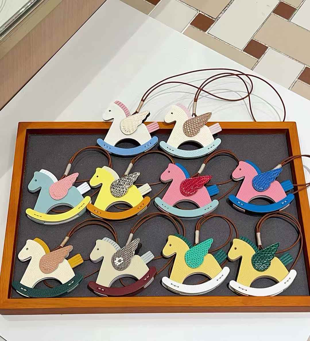 Luxury handcrafted .Cute keychains and backpack charms made of genuine leather 钥匙、背包手工真皮挂件）（副本）（副本）