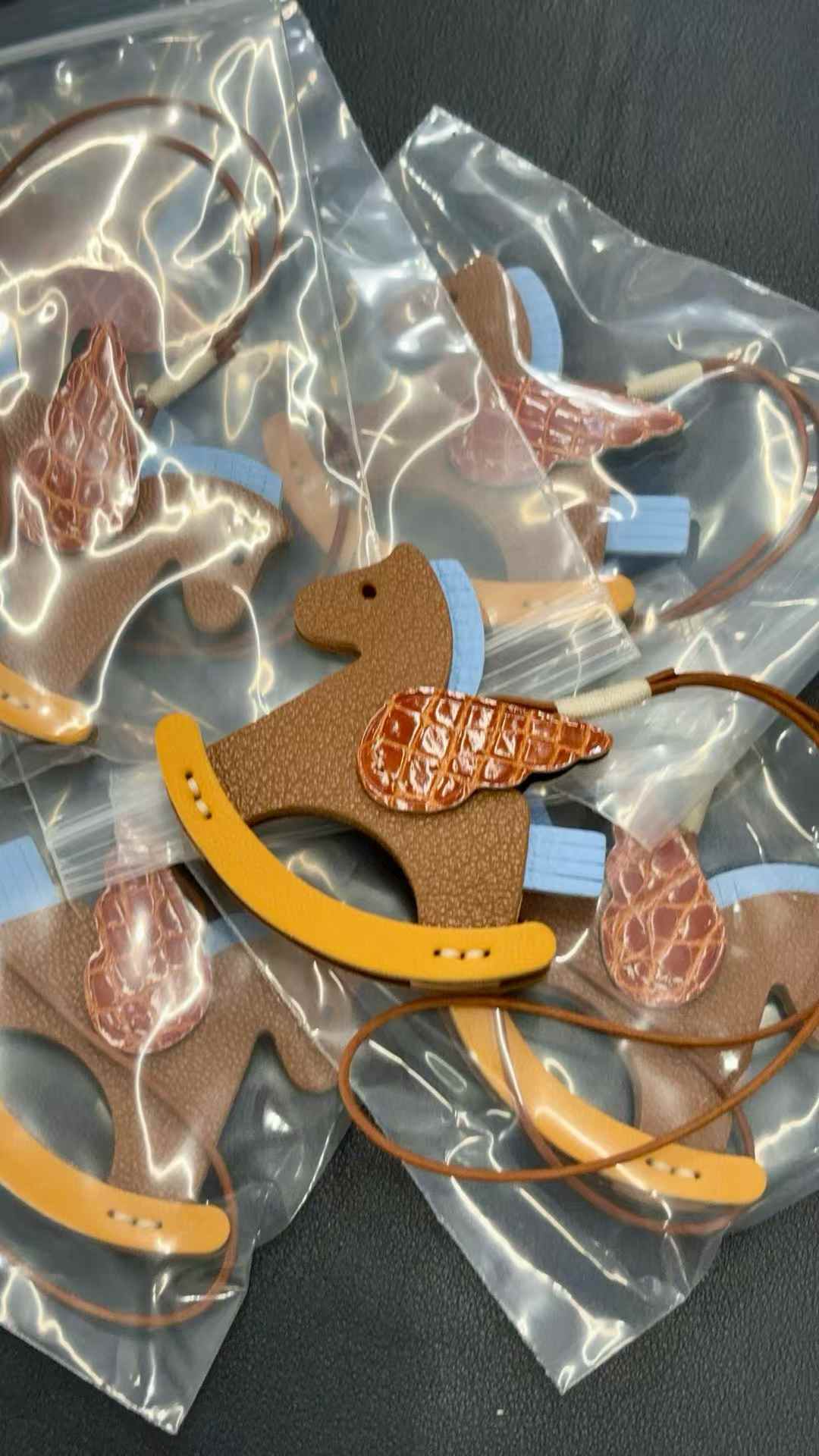 Luxury handcrafted .Cute keychains and backpack charms made of genuine leather 钥匙、背包手工真皮挂件）（副本）（副本）