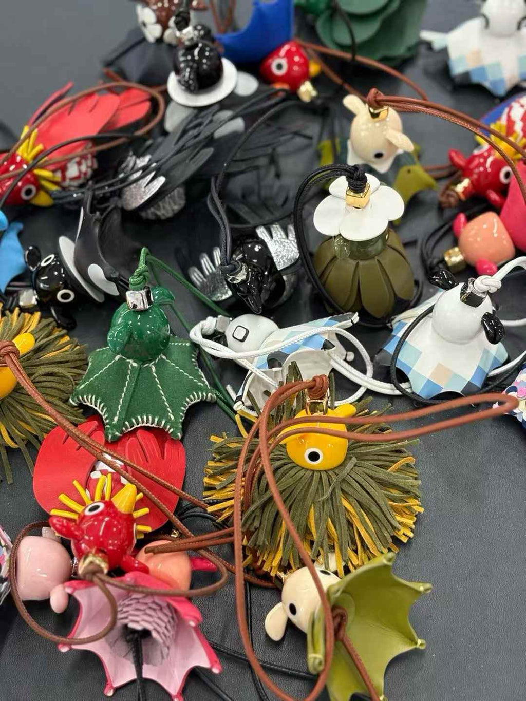 Luxury handcrafted .Cute keychains and backpack charms made of genuine leather 钥匙、背包手工真皮挂件）（副本）（副本）