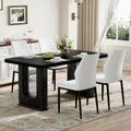 Table and chair set.64.5 x 35.4 Inch Stylish Black Wood Color Textured Dining Table.Paired with 4 Black - and - White PU Dining Chairs with Shell - pattern. Exudes A Strong Sense Of Fashion.